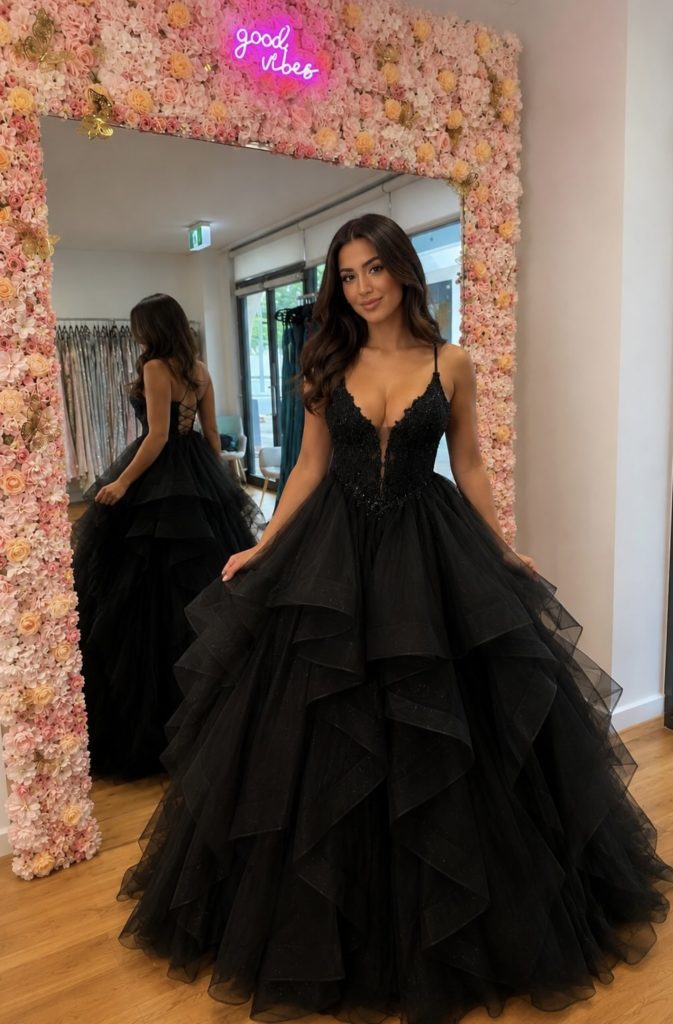 Black princess ball gown with layered tulle skirt and fitted corset bodice available at KKW Formal Dresses Perth.