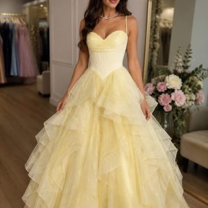 Yellow princess corset ball gown with layered glitter tulle skirt available for hire in Perth at KKW Perth Formal Dresses.